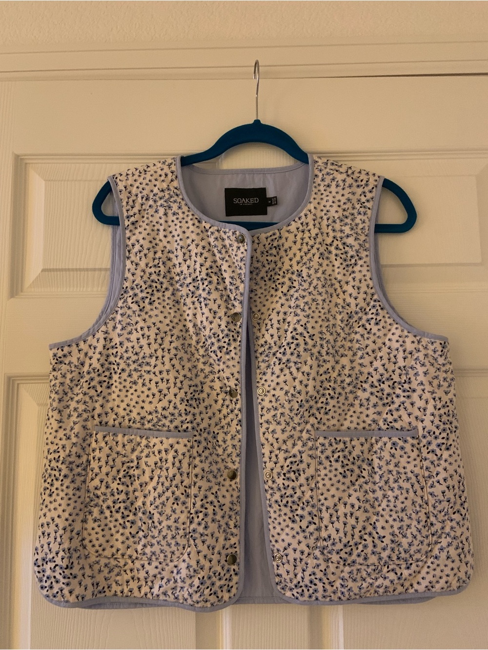 Soaked in Luxury Blue Floral Quilted Vest